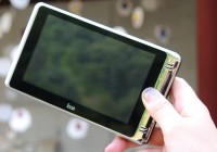MyRacer lisse H10 HD PMP with 5-inch 720p Screen on hand