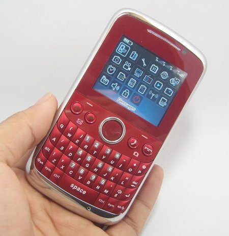OTECH F1 Quad-SIM Mobile Phone on hand OTECH F1 Quad-SIM Mobile Phone on hand